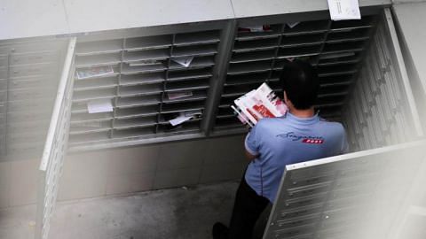SingPost apologises for service failures during year-end peak season, even as postmen pull extra hours