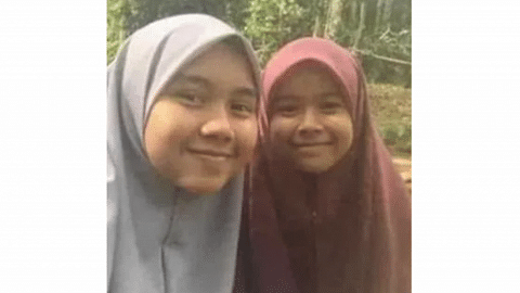 Sisters killed in Malaysia fire while parents were out preparing food for firefighters 