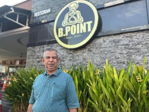 TIDAK SABAR SAMBUT SEMULA PELANGGAN SINGAPURA: Encik Ali Liyakathali berkata kedai makannya, B.Point, "tenggelam" kerana tiada pelanggan sejak Koswe ditutup mulai Mac 2020. Kini beliau tidak "sabar ingin melihat lebih ramai" pelanggan Singapura datan