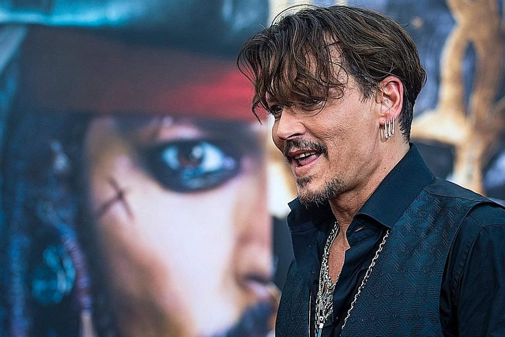 Johnny Depp giat promosi filem di balik masalah