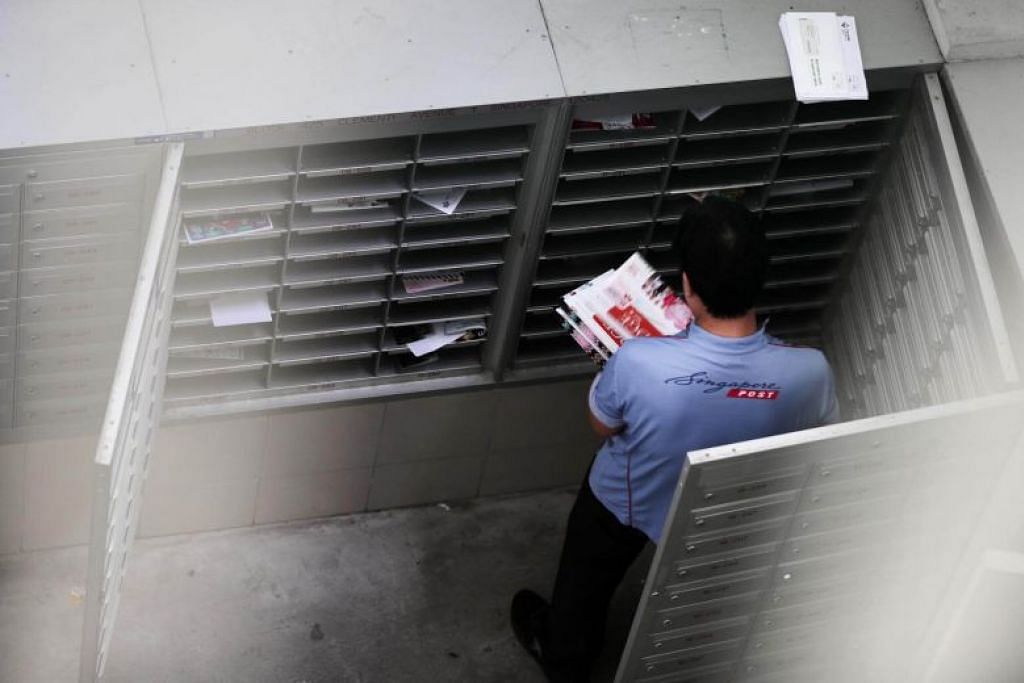 SingPost apologises for service failures during year-end peak season, even as postmen pull extra hours
