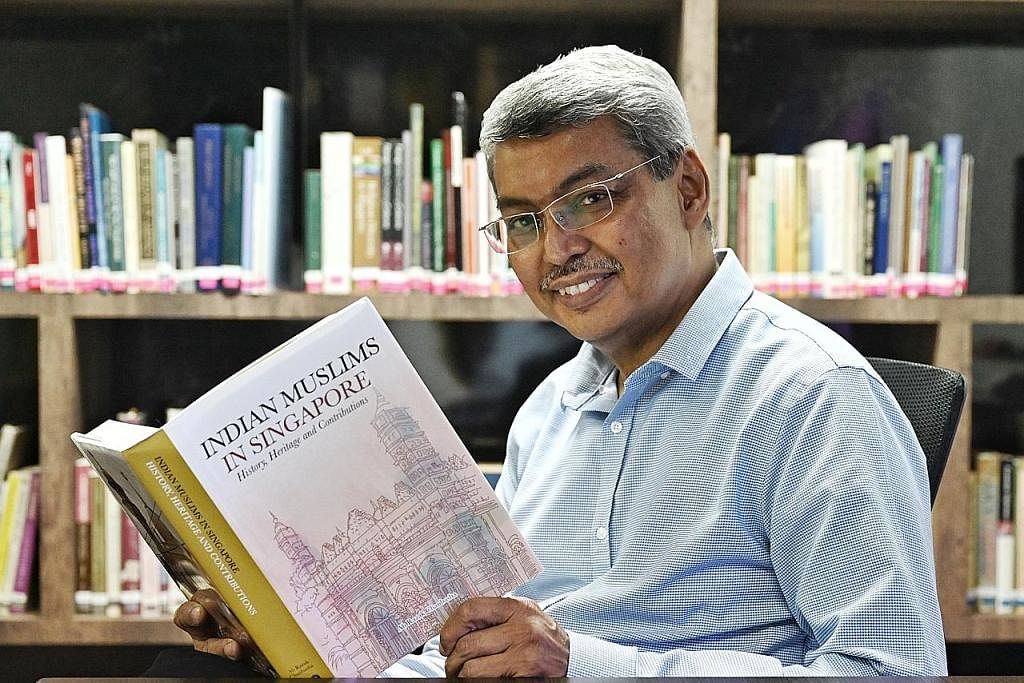 BAKTI KEPADA MASYARAKAT: Dr Ab Razak yang diiktiraf dengan Anugerah Jasa Cemerlang Muis tahun ini bersama buku tulisannya yang dilancar baru-baru ini yang menyusur sejarah, warisan serta sumbangan masyarakat India Muslim di Singapura.